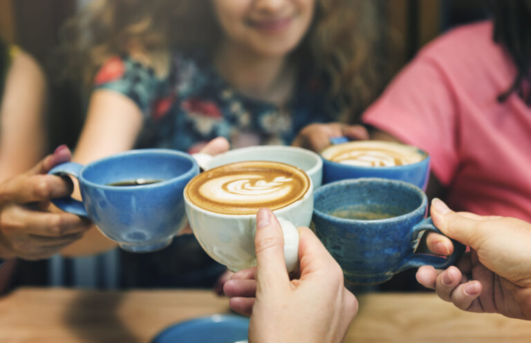 Young Women Drinking Coffee Concept